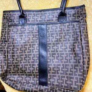 Minimally worn carryall.Tan and black.